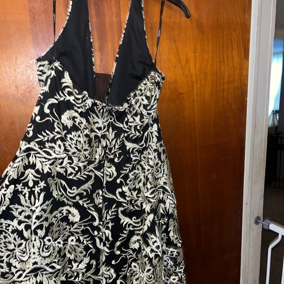 Elegant Black and Gold Halter Cocktail Dress - Picture 2 of 2